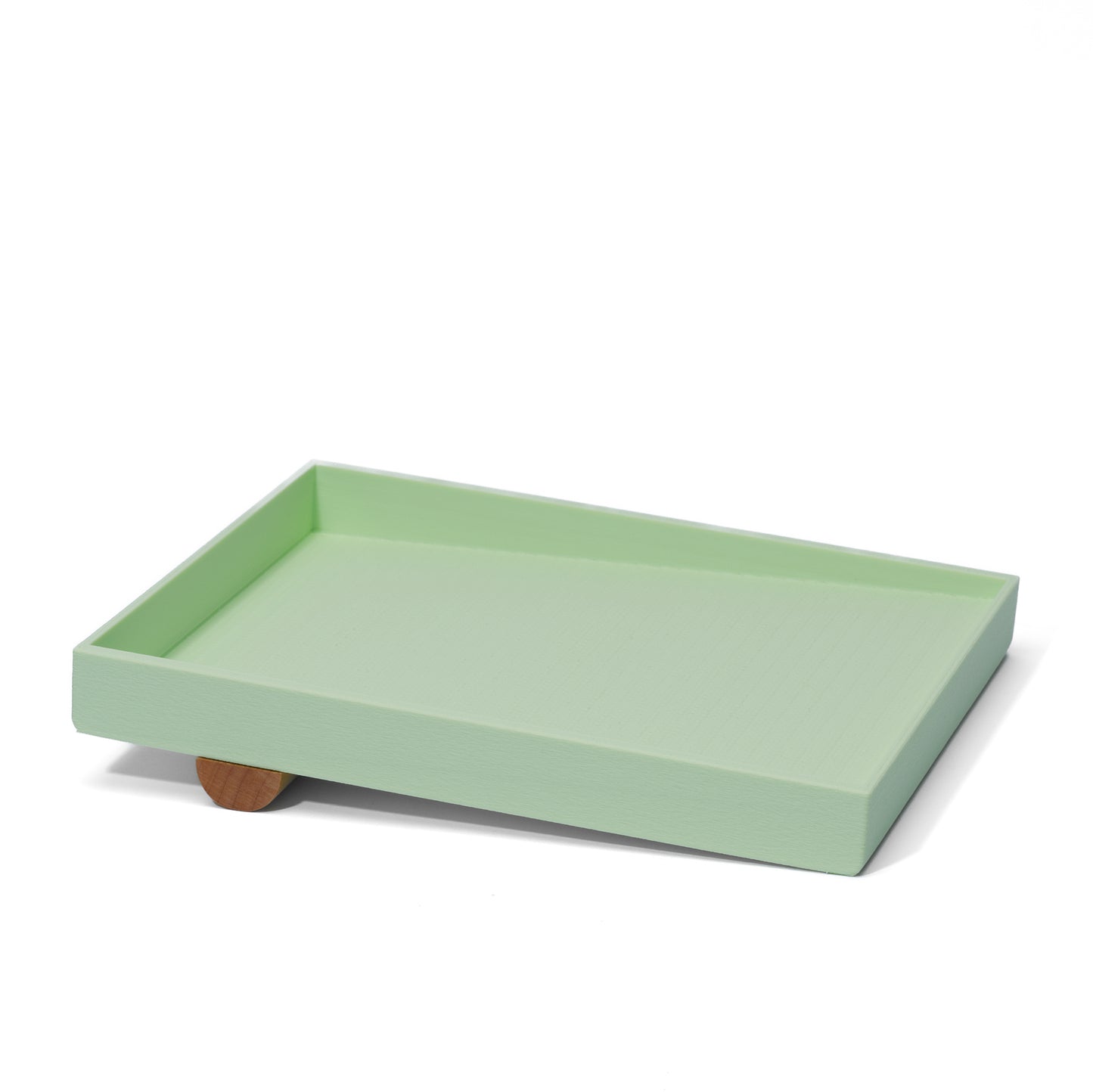 mint green catch-all tray against a white background